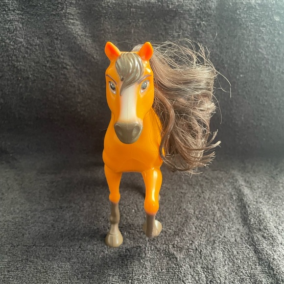 A collection of DreamWorks toy horses from “Spirit Riding Free” - Picture 9 of 15